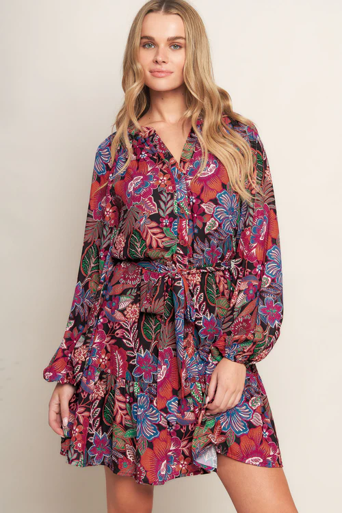 A stunning maxi dress with a sweetheart neckline and vibrant floral print.